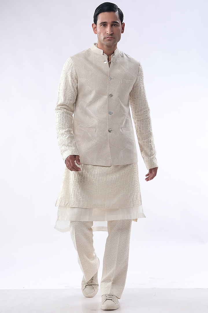 Off-White Chanderi & Cotton Silk Resham Embroidered Bundi Jacket Set by Kommal Sood