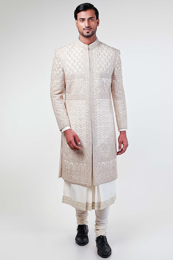 Off-White Raw Silk Hand & Machine Embroidered Sherwani Set by Kommal Sood