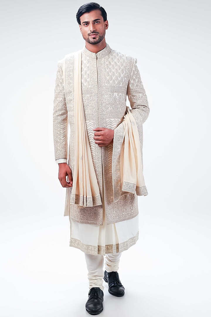 Off-White Raw Silk Hand & Machine Embroidered Sherwani Set by Kommal Sood