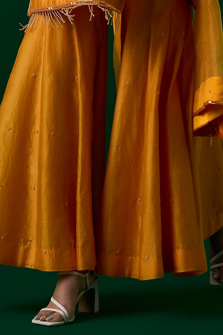 Mustard Yellow Chanderi Silk Crystal Hand Embroidered Party Wear Sharara Set by Label Meesa at Pernia's Pop Up Shop