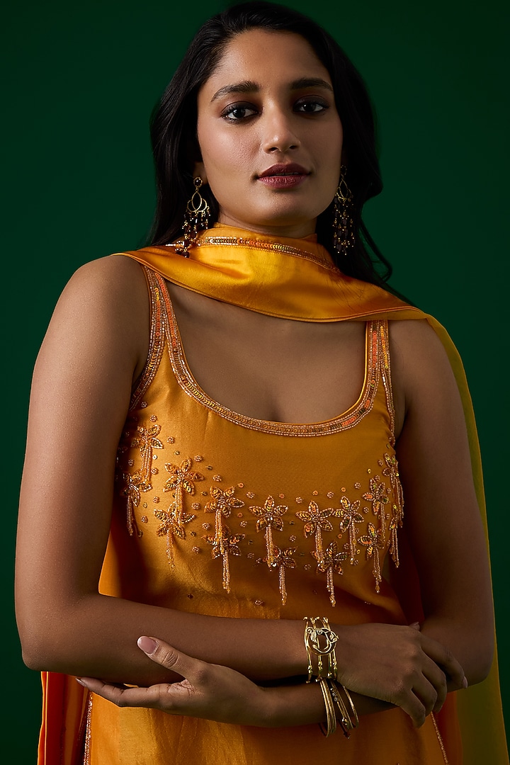 Mustard Yellow Chanderi Silk Crystal Hand Embroidered Party Wear Sharara Set by Label Meesa at Pernia's Pop Up Shop