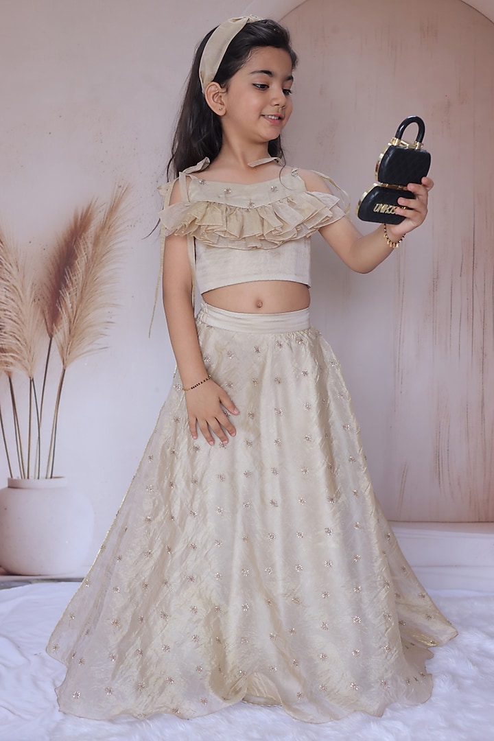 Champagne Crushed Silk Floral Motif Embellished Lehenga Set For Girls by Little Loom at Pernia's Pop Up Shop