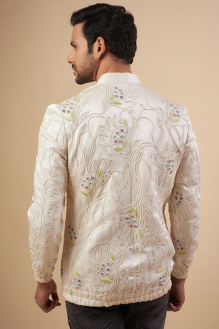 Ivory Linen Satin Cord Embroidered Bomber Jacket by LABEL POOJA RANKA at Pernia's Pop Up Shop