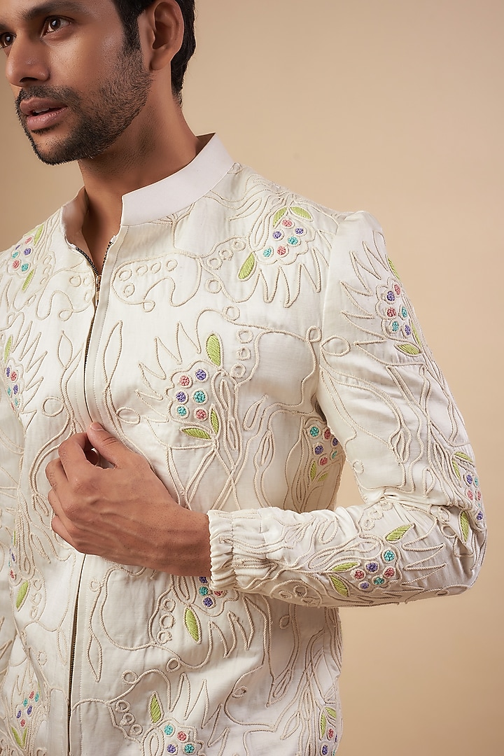 Ivory Linen Satin Cord Embroidered Bomber Jacket by LABEL POOJA RANKA at Pernia's Pop Up Shop