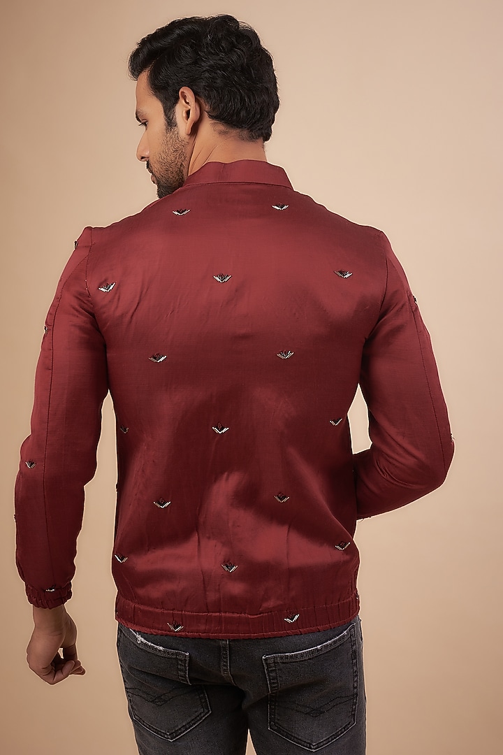 Maroon Linen Satin Cutdana Embroidered Bomber Jacket by LABEL POOJA RANKA at Pernia's Pop Up Shop