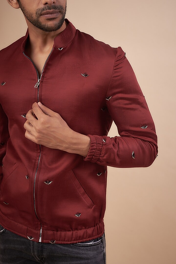Maroon Linen Satin Cutdana Embroidered Bomber Jacket by LABEL POOJA RANKA at Pernia's Pop Up Shop