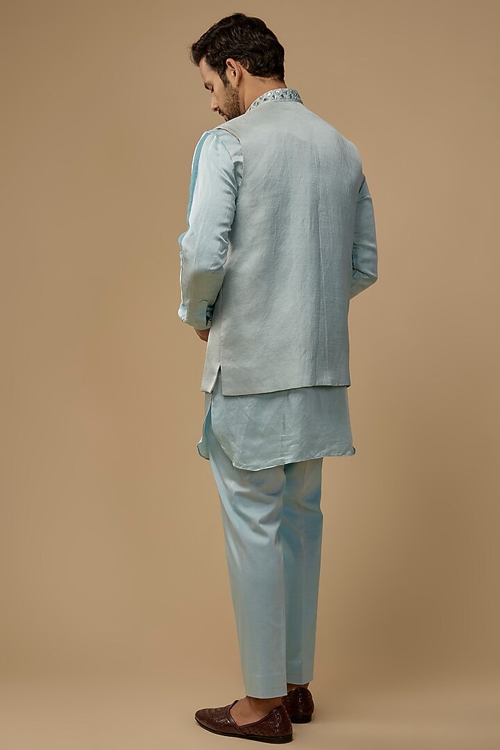 Blue Shimmer Linen Satin Pleated Bundi Jacket Set by LABEL POOJA RANKA at Pernia's Pop Up Shop