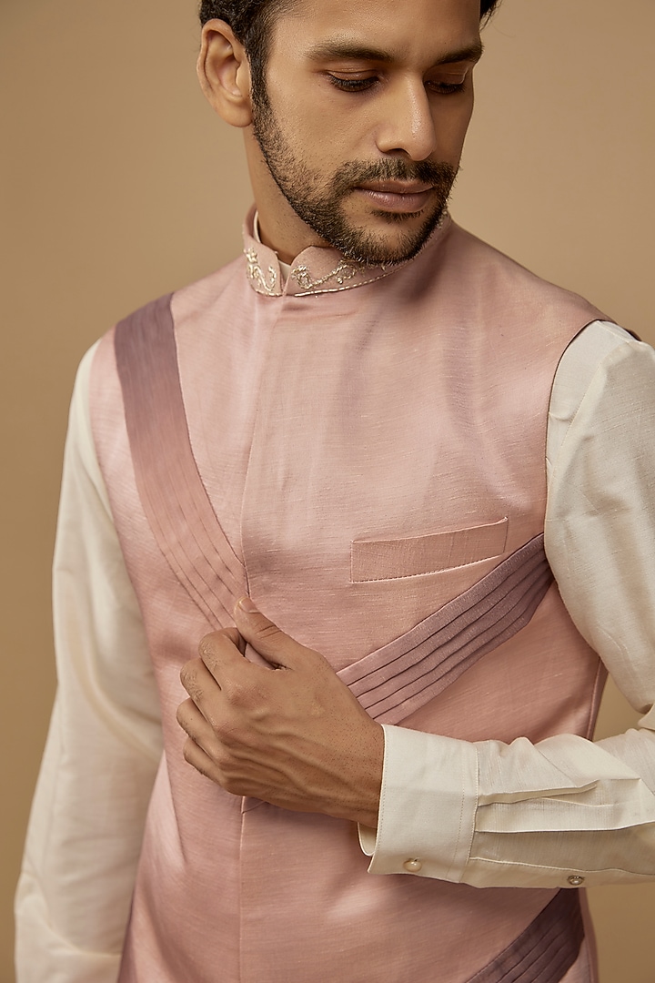 Pink Shimmer Linen Satin Pleated Bundi Jacket by LABEL POOJA RANKA at Pernia's Pop Up Shop