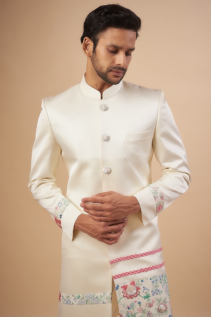 White Linen Satin Floral Embroidered Wedding Sherwani Set by LABEL POOJA RANKA at Pernia's Pop Up Shop