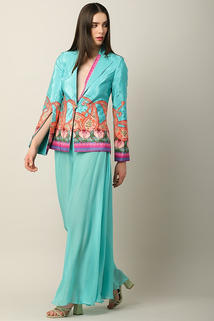 Turquoise Georgette Flared Pants by Limerick By Abirr N' Nanki