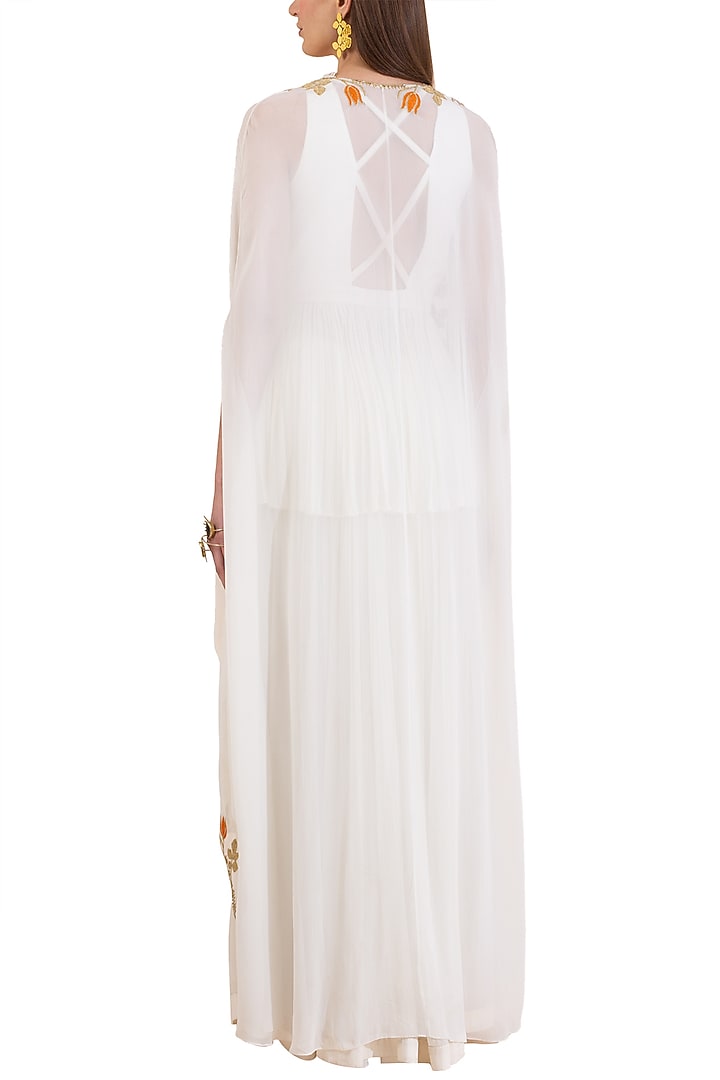 Ivory Embroidered Peplum Blouse With Skirt & Cape by Limerick By Abirr N' Nanki at Pernia's Pop Up Shop
