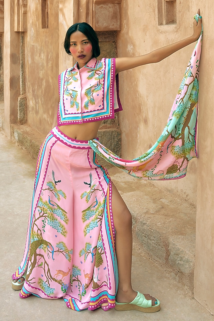 Pink Crepe Printed Flared Pants by Limerick By Abirr N' Nanki at Pernia's Pop Up Shop