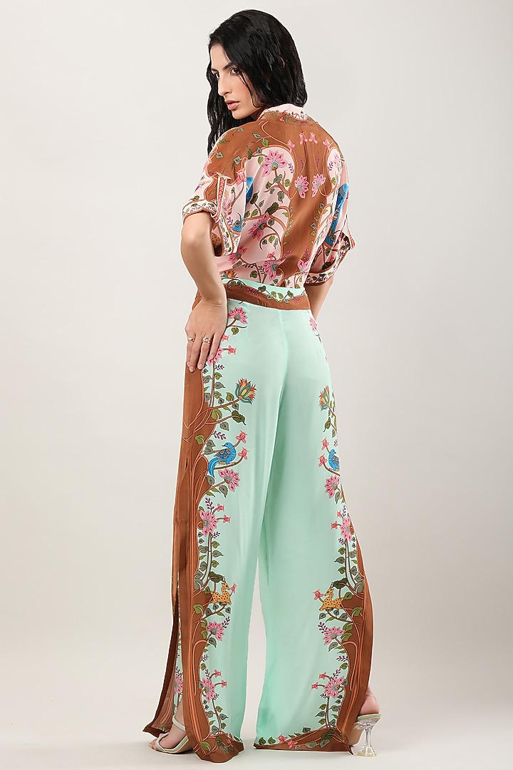 Green Crepe Printed Flared Pants by Limerick By Abirr N' Nanki at Pernia's Pop Up Shop