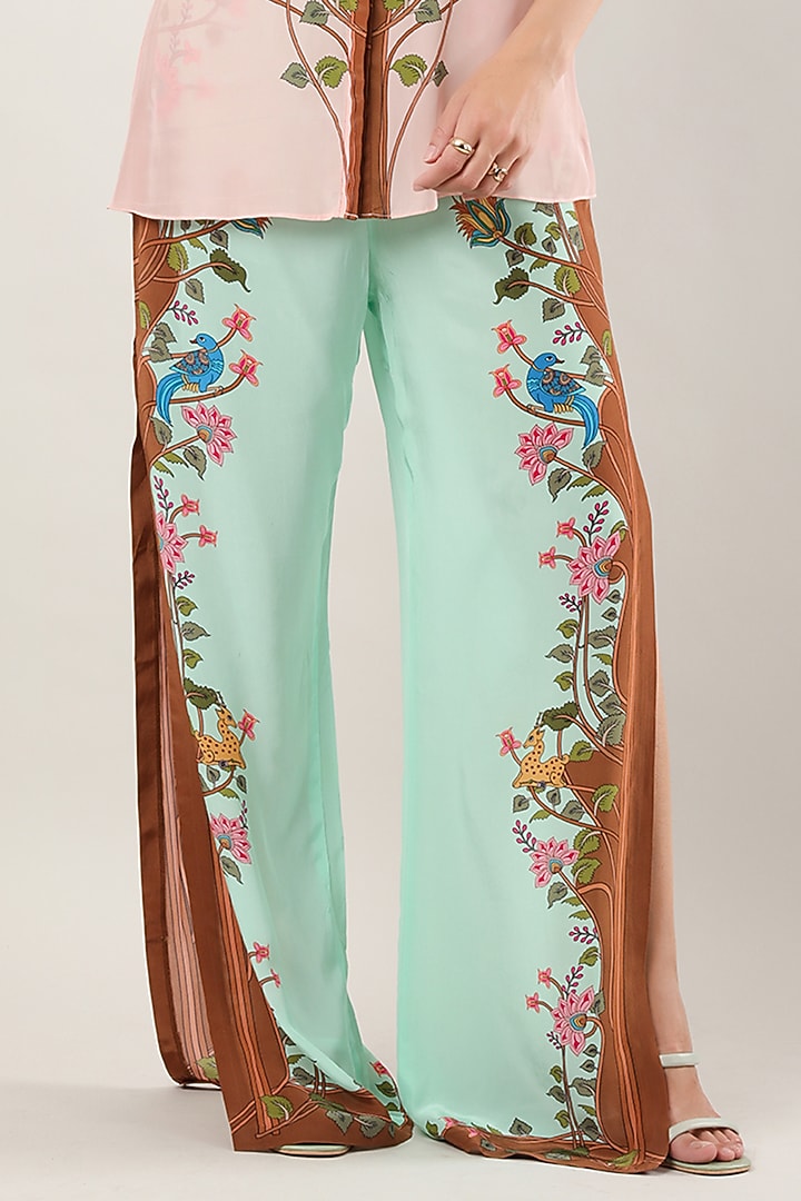 Green Crepe Printed Flared Pants by Limerick By Abirr N' Nanki at Pernia's Pop Up Shop