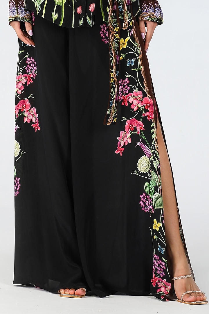 Black Crepe Placement Printed Pants by Limerick By Abirr N' Nanki at Pernia's Pop Up Shop
