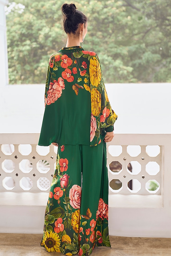 Emerald Green Crepe Floral Printed Flared Pants by Limerick By Abirr N' Nanki at Pernia's Pop Up Shop