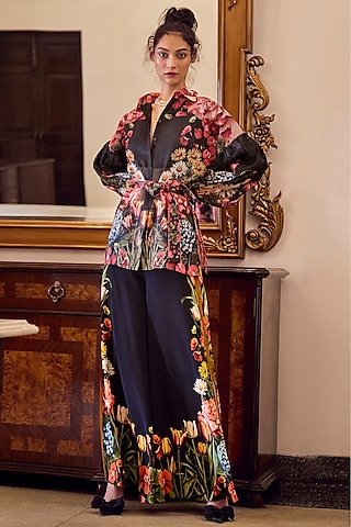Black Crepe Printed Flared Pants by Limerick By Abirr N' Nanki