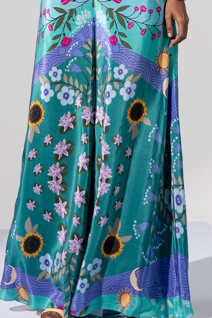 Powder Blue Printed Flared Pants by Limerick By Abirr N' Nanki at Pernia's Pop Up Shop