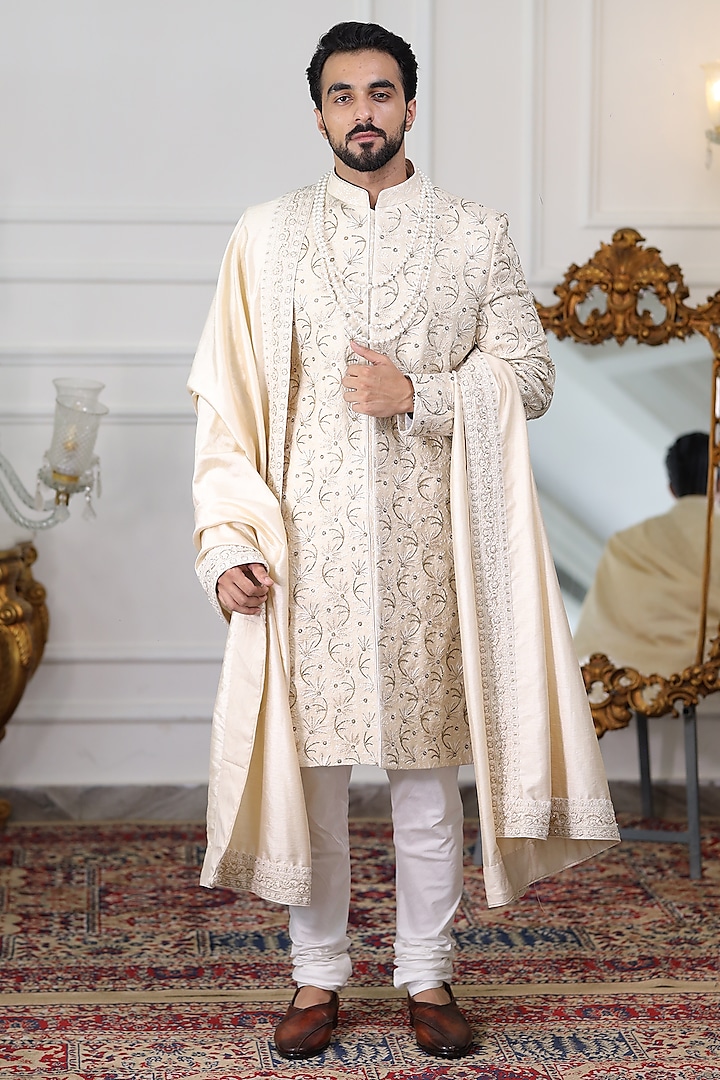 Ivory Pure Silk Dabka Embroidered Sherwani Set by Label Mukund Taneja