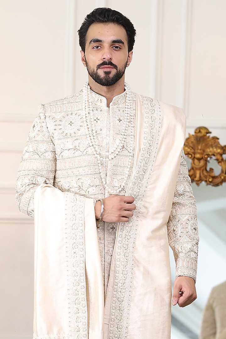Ivory Pure Silk Dabka Embroidered Groom Sherwani Set by Label Mukund Taneja at Pernia's Pop Up Shop