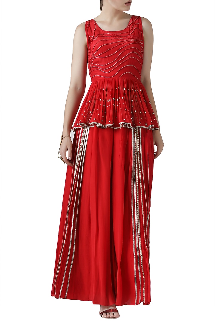 Red embroidered peplum top with pants by Limerick By Abirr N' Nanki at Pernia's Pop Up Shop