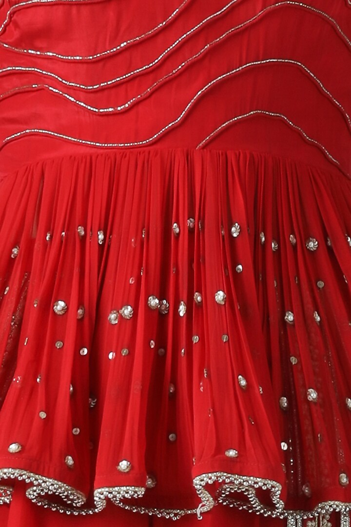 Red embroidered peplum top with pants by Limerick By Abirr N' Nanki at Pernia's Pop Up Shop