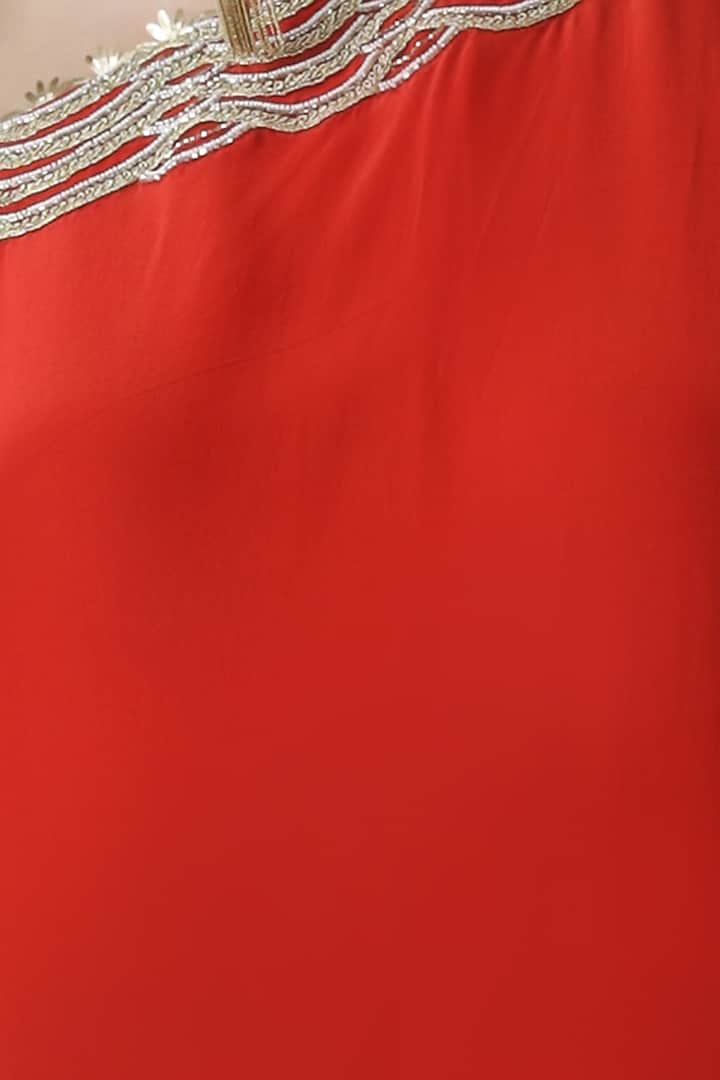 Red embroidered asymmetrical kurta with tulip pants by Limerick By Abirr N' Nanki at Pernia's Pop Up Shop