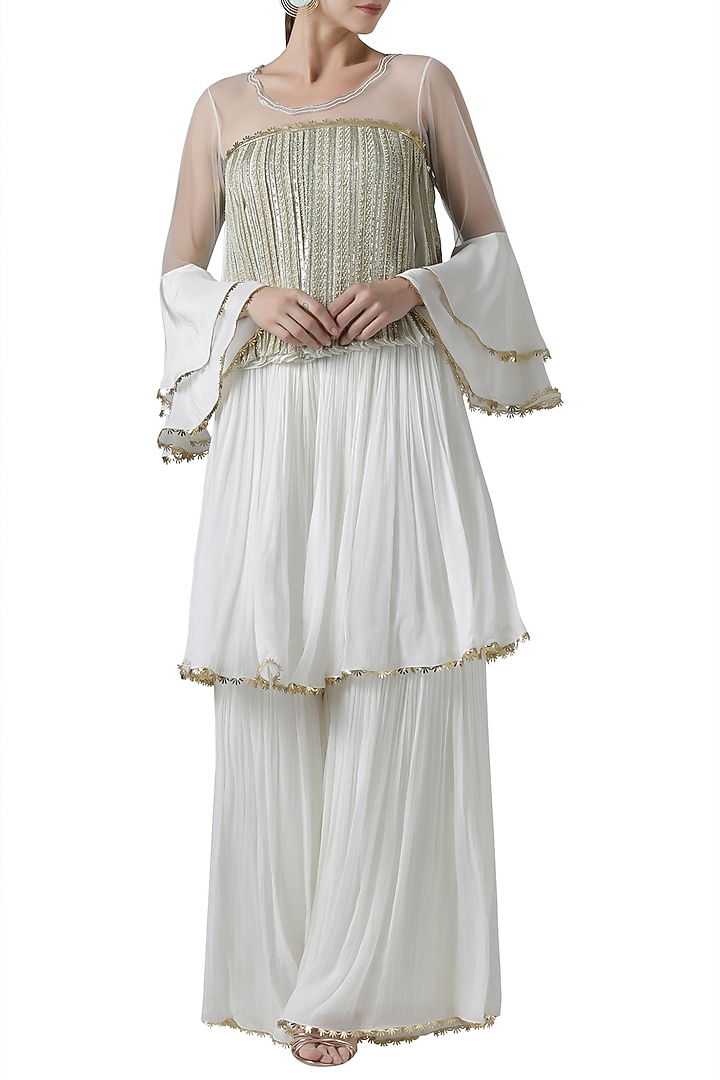 Ivory embroidered blouse with palazzo pants by Limerick By Abirr N' Nanki at Pernia's Pop Up Shop