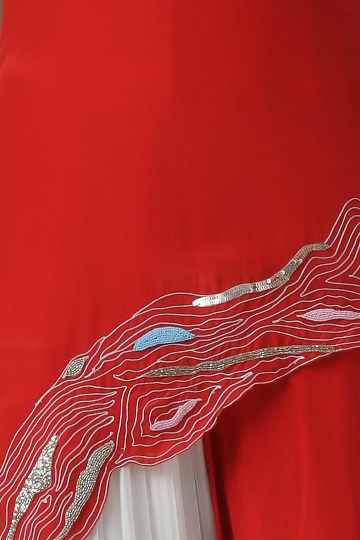 Red embroidered tunic with ivory pants by Limerick By Abirr N' Nanki at Pernia's Pop Up Shop
