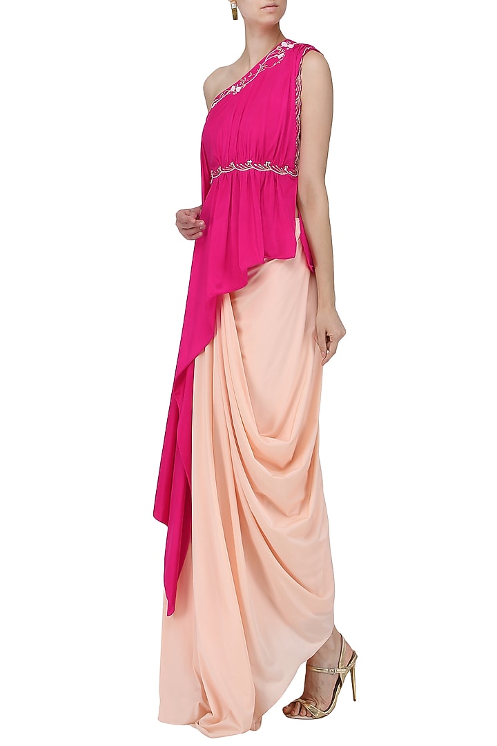 Fuschia pink embroidered asymmetrical top with blush pink drape skirt available only at Pernia's Pop Up Shop.