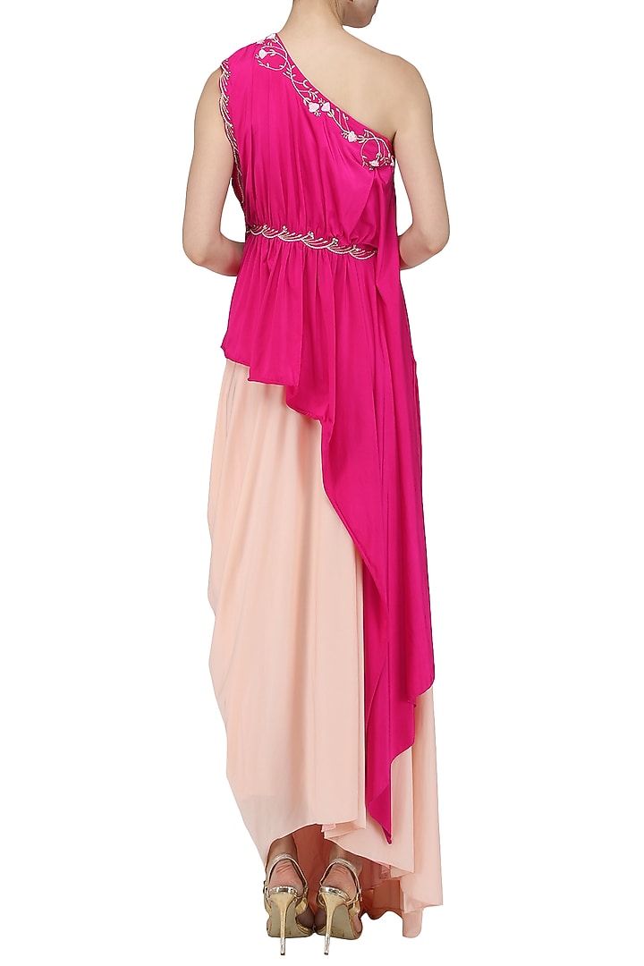 Fuschia pink embroidered asymmetrical top with blush pink drape skirt available only at Pernia's Pop Up Shop.
