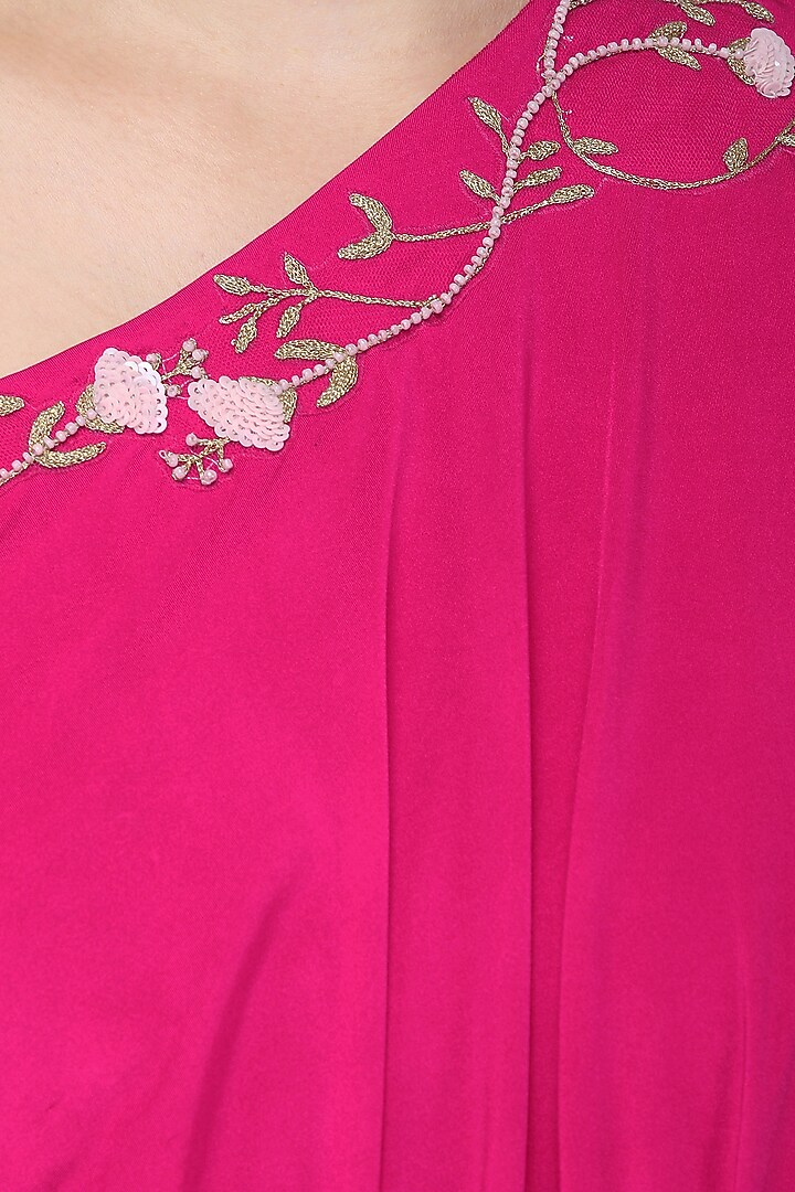 Fuschia pink embroidered asymmetrical top with blush pink drape skirt available only at Pernia's Pop Up Shop.
