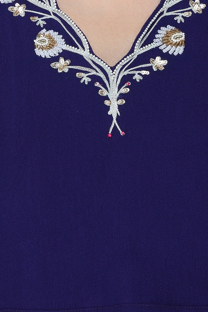Navy blue embroidered crop top, sharara pants and cape available only at Pernia's Pop Up Shop.
