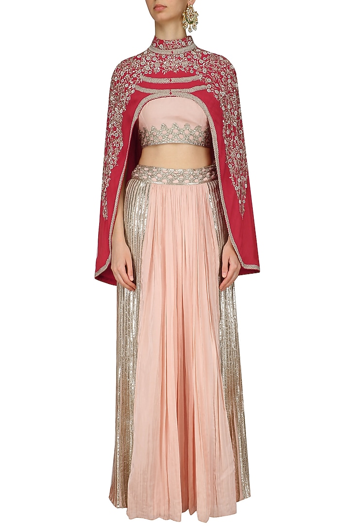 Red embroidered cape with peach blouse and skirt set available only at Pernia's Pop Up Shop.