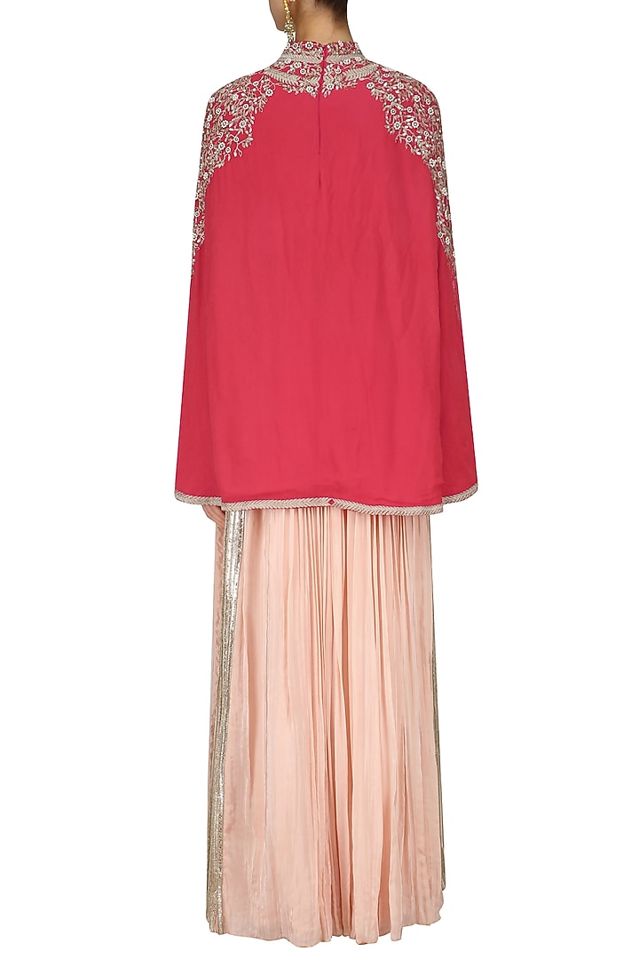 Red embroidered cape with peach blouse and skirt set available only at Pernia's Pop Up Shop.