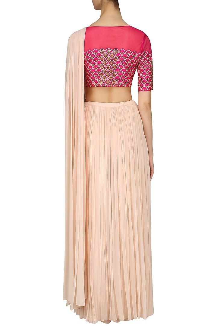 Fuschia pink embroidered blouse and pant saree set available only at Pernia's Pop Up Shop.