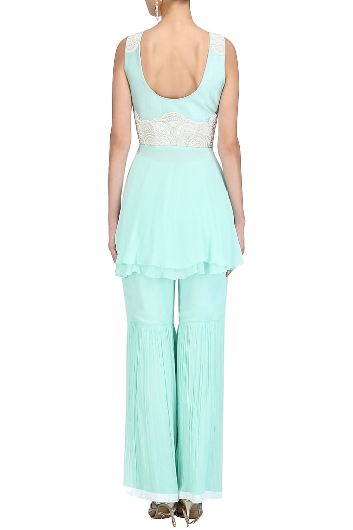 Mint sequins and bead short kurta with crinkled sharara set available only at Pernia's Pop Up Shop.
