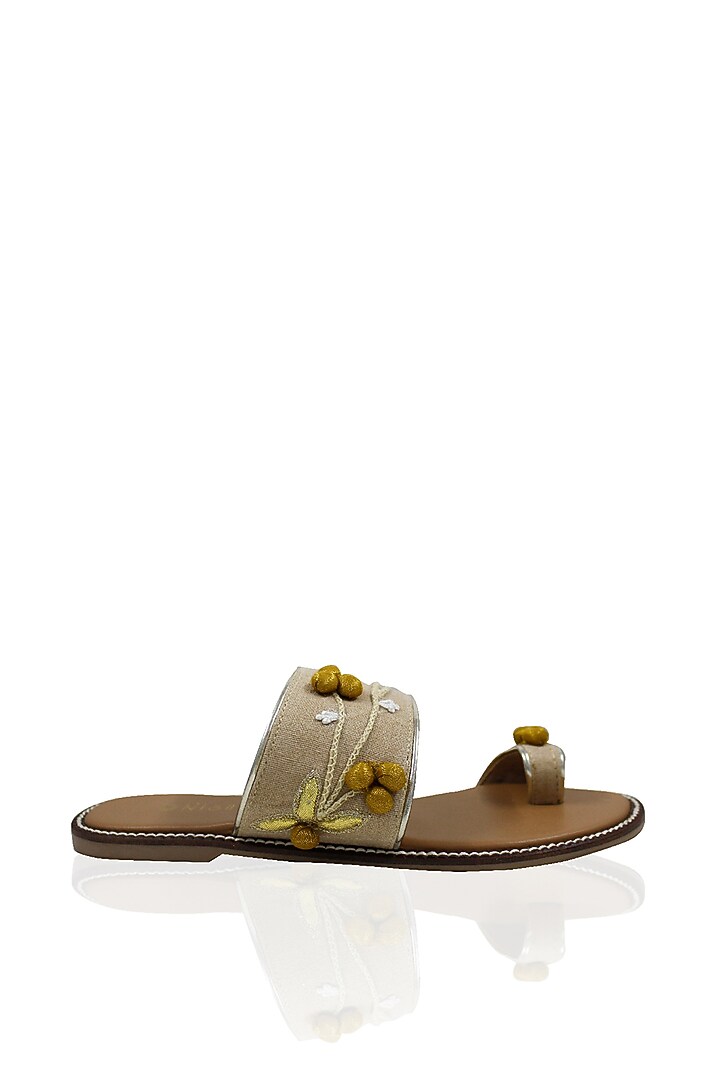 Beige Hand Embroidered Flats by Leonish By Nidhi Sheth at Pernia's Pop Up Shop