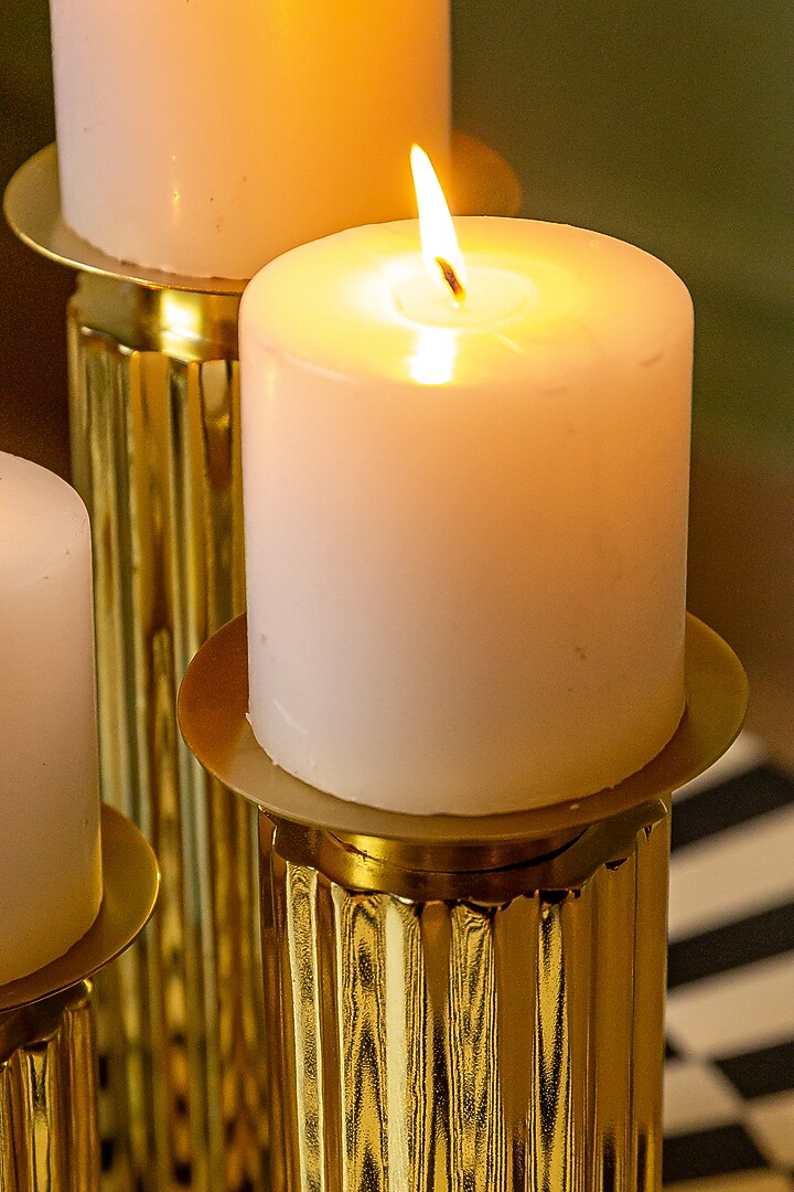 Shiny Gold Stainless Steel Candle Holders (Set of 3) by Logam at Pernia's Pop Up Shop