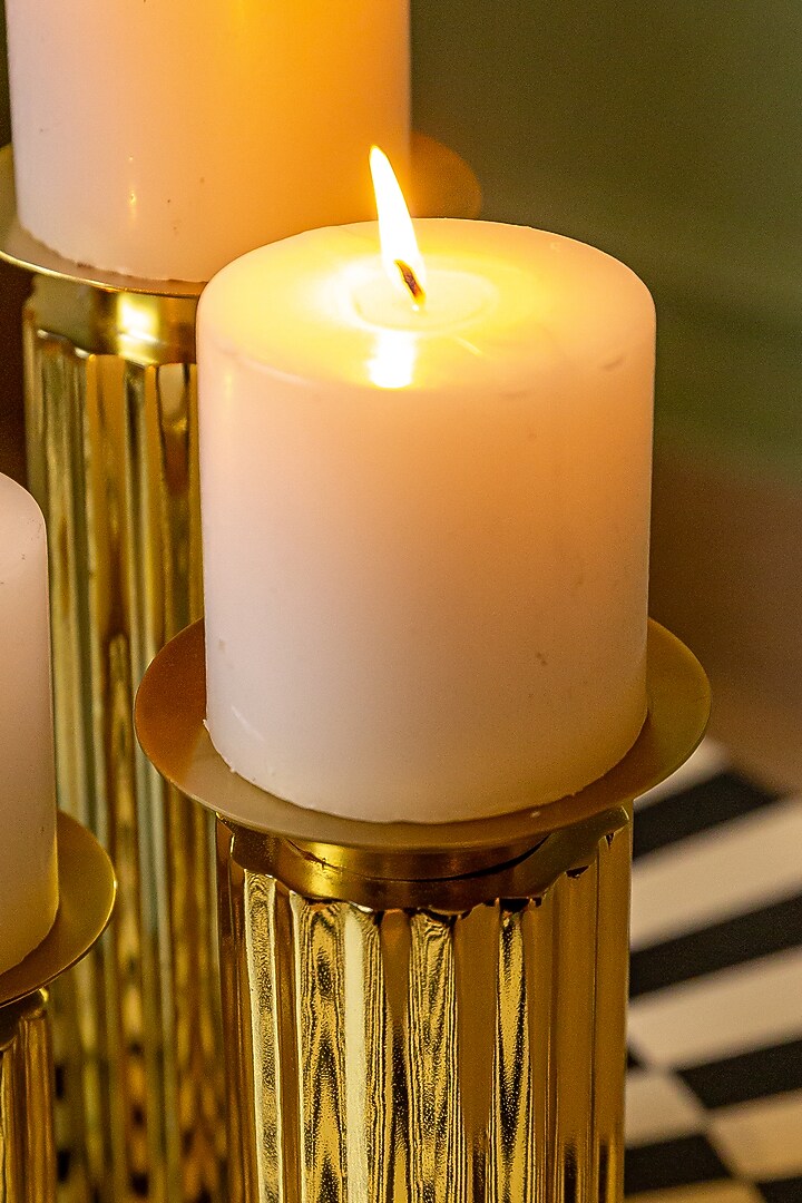 Shiny Gold Stainless Steel Candle Holders (Set of 3) by Logam at Pernia's Pop Up Shop