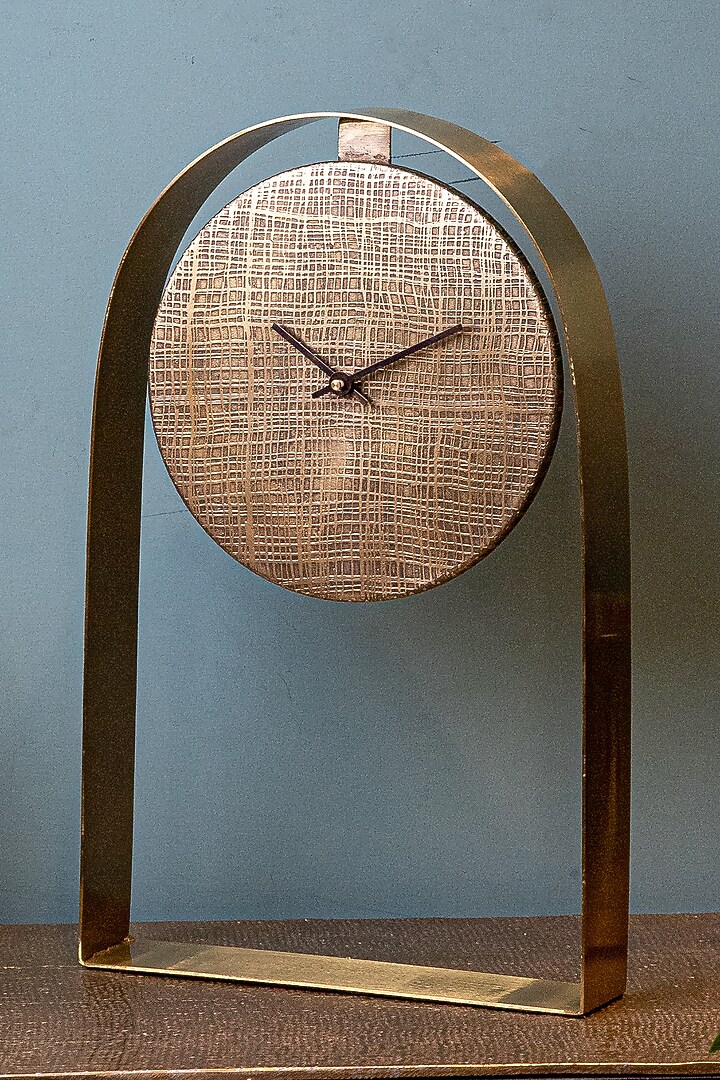 Gold Stainless Steel Clock by Logam at Pernia's Pop Up Shop