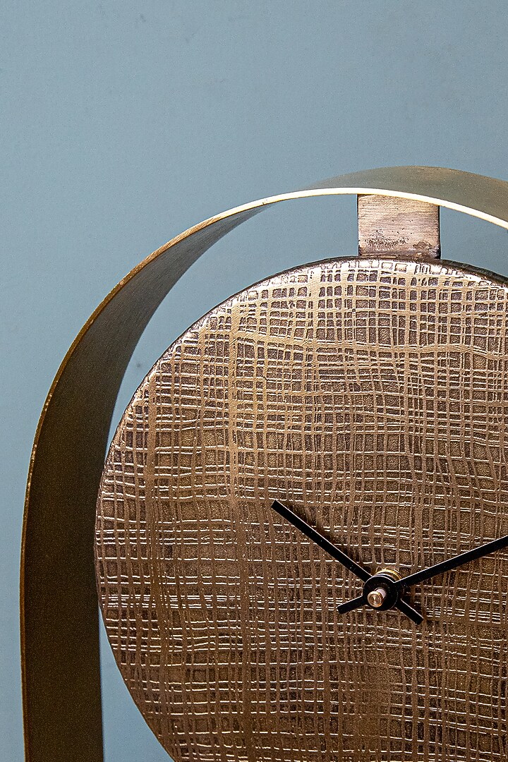 Gold Stainless Steel Clock by Logam at Pernia's Pop Up Shop