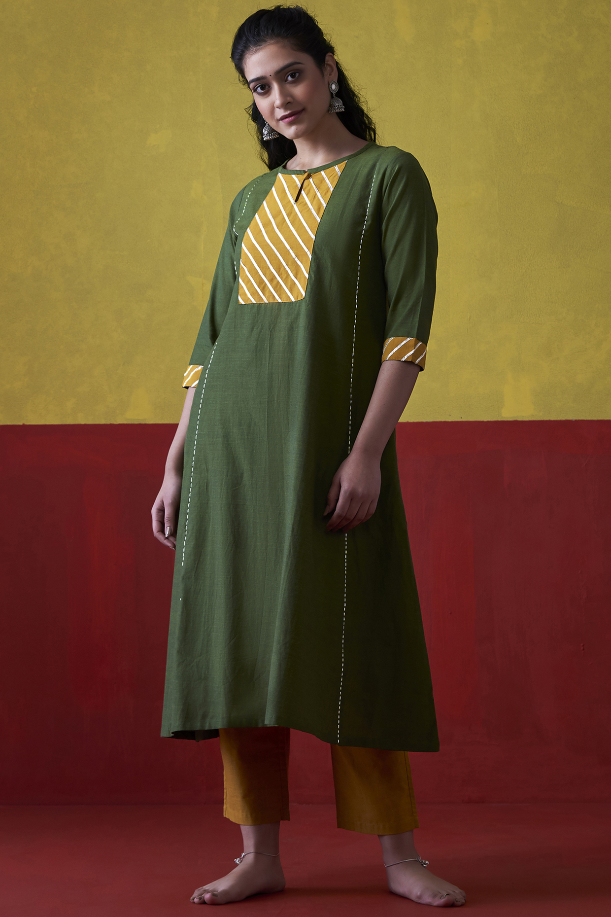 Emerald Green & Mustard Hand Embroidered A-Line Kurta Set by Lokatita