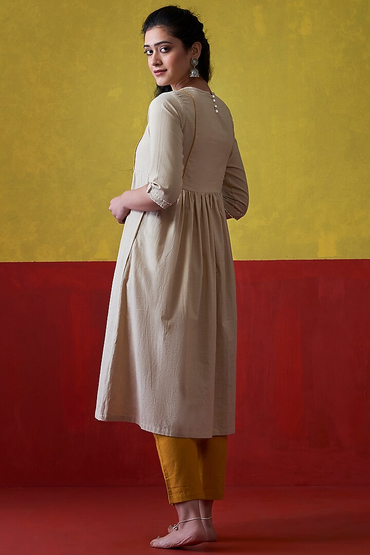 Beige Hand Embroidered A-Line Kurta by Lokatita at Pernia's Pop Up Shop