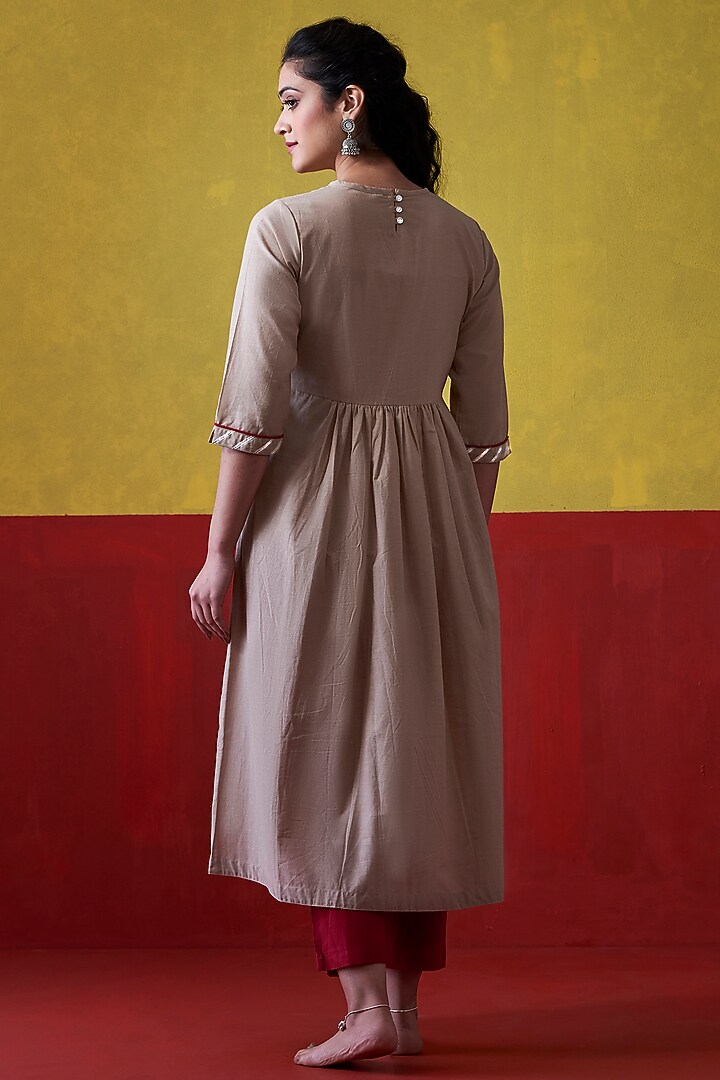 Beige Embroidered A-Line Kurta by Lokatita at Pernia's Pop Up Shop