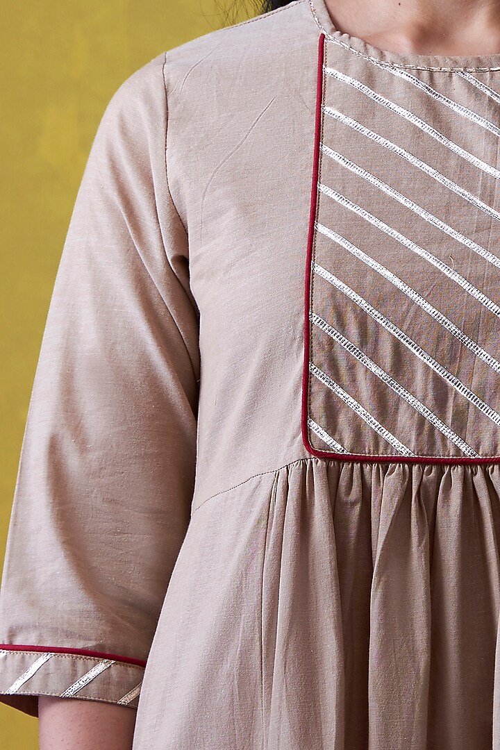 Beige Embroidered A-Line Kurta by Lokatita at Pernia's Pop Up Shop