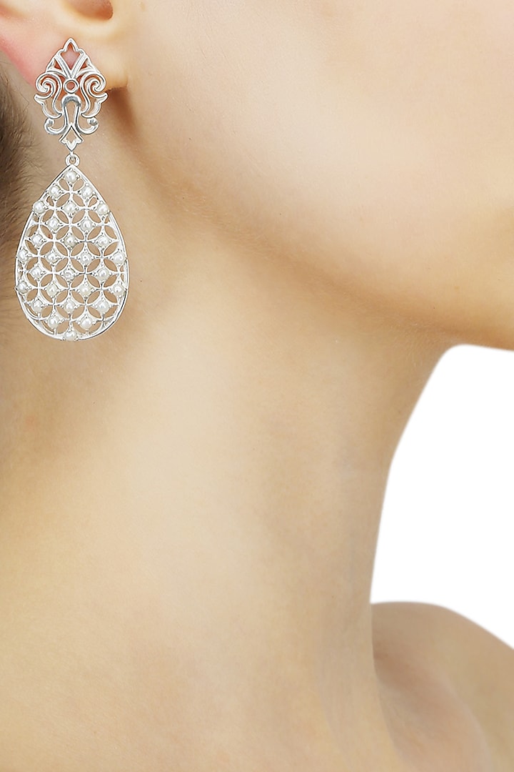 Silver finish seed pearls jali pattern earrings available only at Pernia's Pop Up Shop.