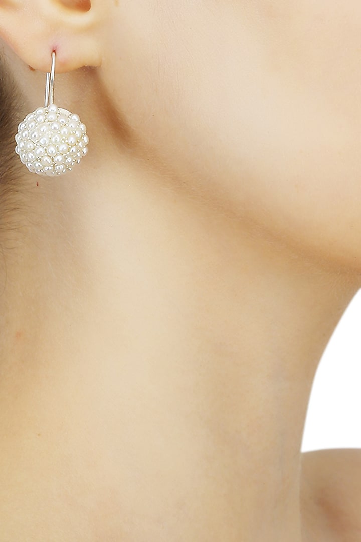 Silver finish seed pearls classic dome earrings available only at Pernia's Pop Up Shop.