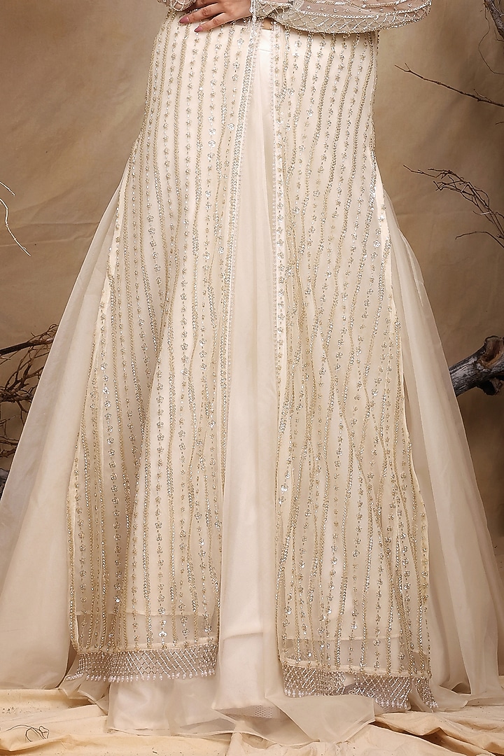 Ivory Organza Sequins Hand Embroidered Jacket Wedding Lehenga Set by LASHA at Pernia's Pop Up Shop