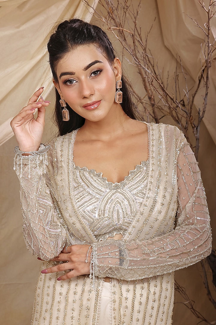 Ivory Organza Sequins Hand Embroidered Jacket Wedding Lehenga Set by LASHA at Pernia's Pop Up Shop